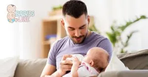 Dad pace feeding baby