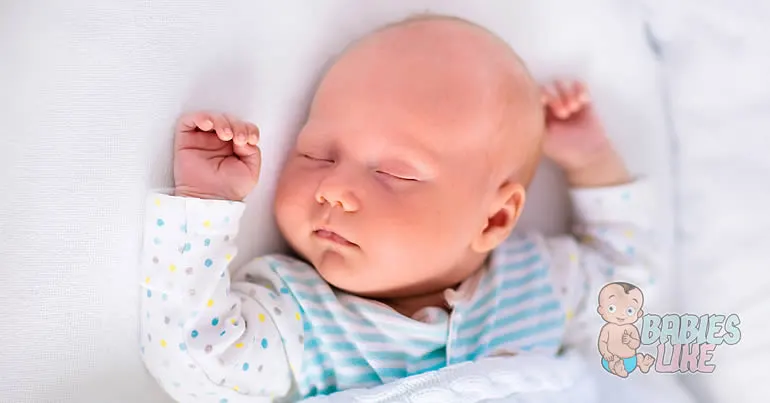 Baby sleeping in freshly cleaned bassinet